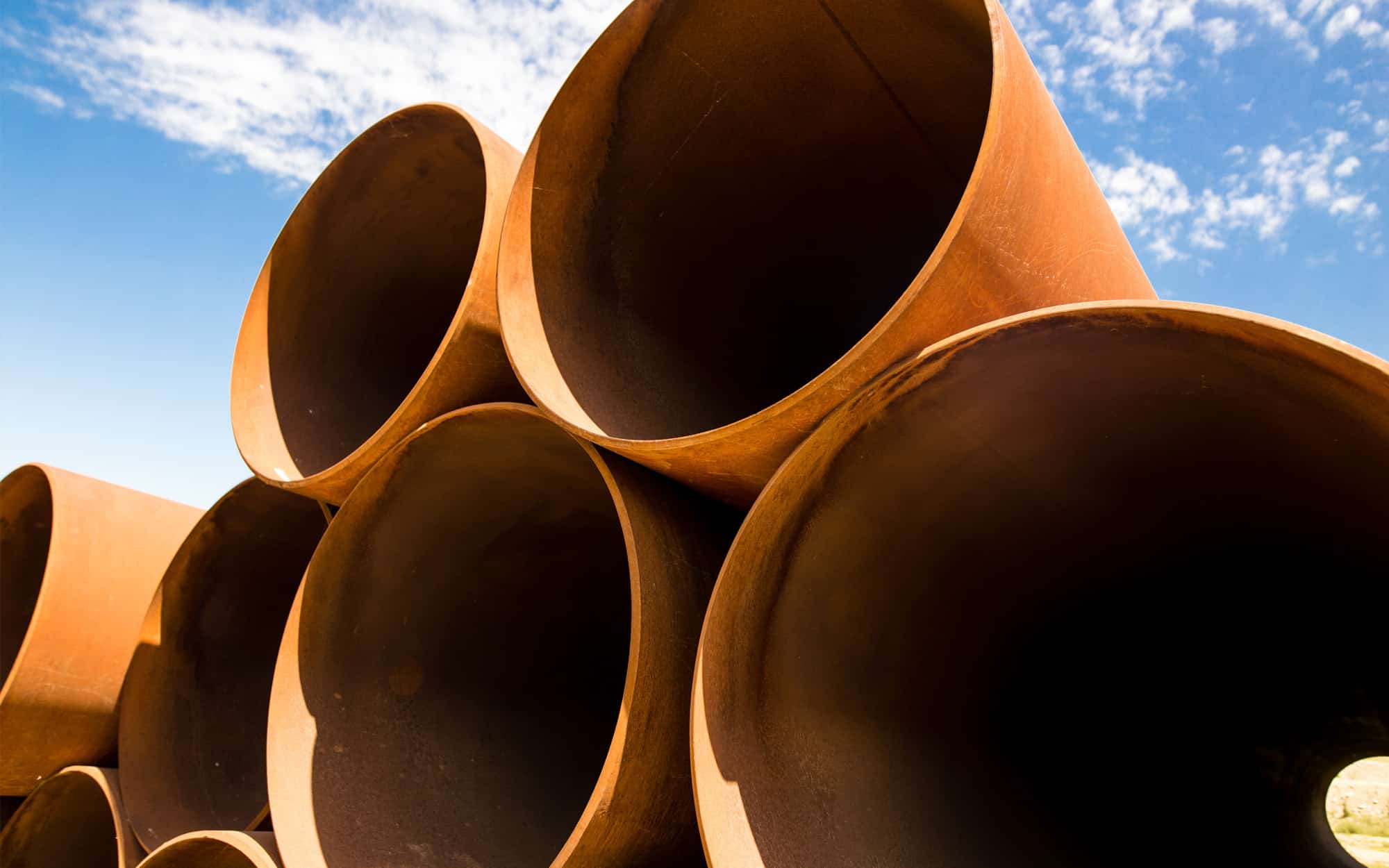 large rusty metal pipes as a background