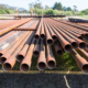 Front view of many drill pipes